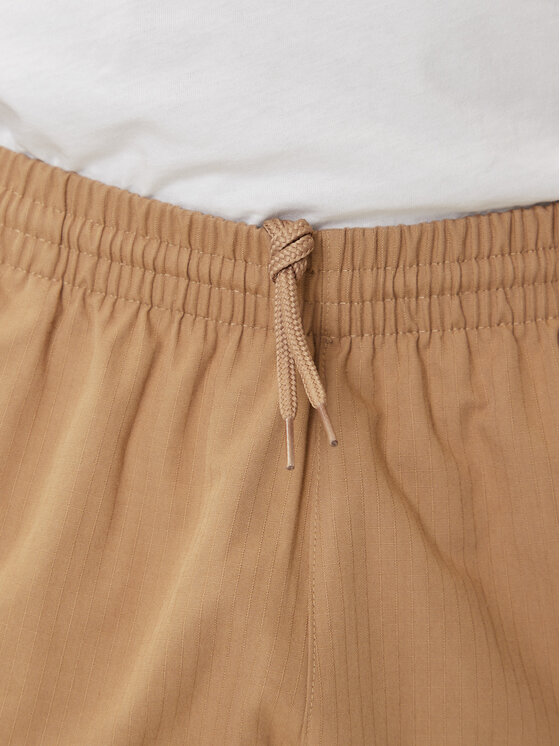 adidas adidas Spodnji del trenirke Trefoil Essentials JX3912 Bež Loose Fit
