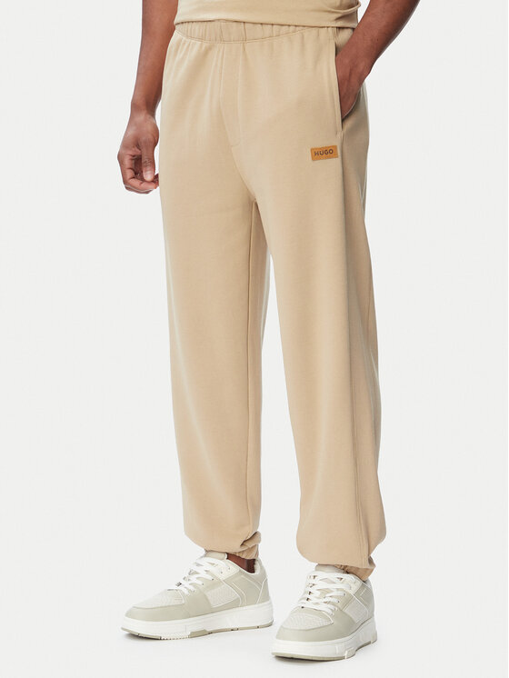 HUGO HUGO Долнище анцуг Nevatro 50564047 Бежов Regular Fit