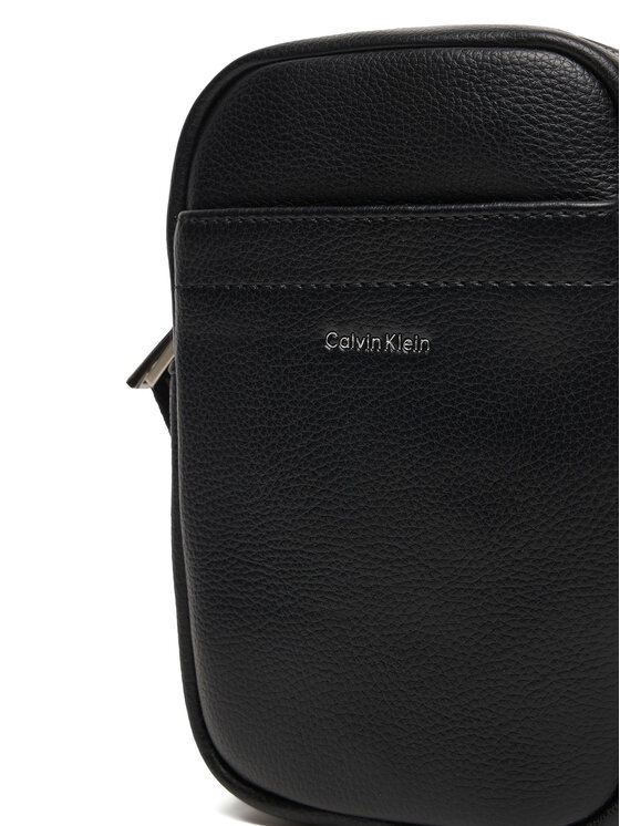 Calvin Klein Calvin Klein Crossover torbica Raised Slim Reporter LV04D3278G Crna
