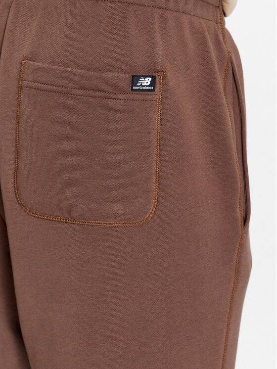 New Balance New Balance Spodnie dresowe NB Essentials Sweatpant MP33509 Brązowy Regular Fit