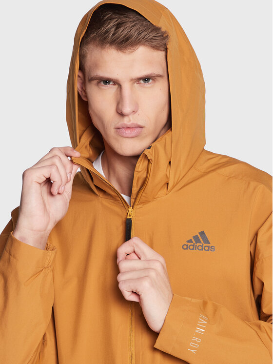 adidas adidas Prehodna jakna Traveer RAIN.RDY Jacket (Gender Neutral) HG6013 Bež Regular Fit