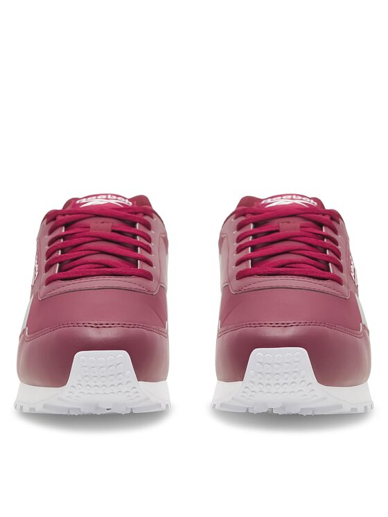 Dwa buty sportowe ustawione przodem w stron? obiektywu.