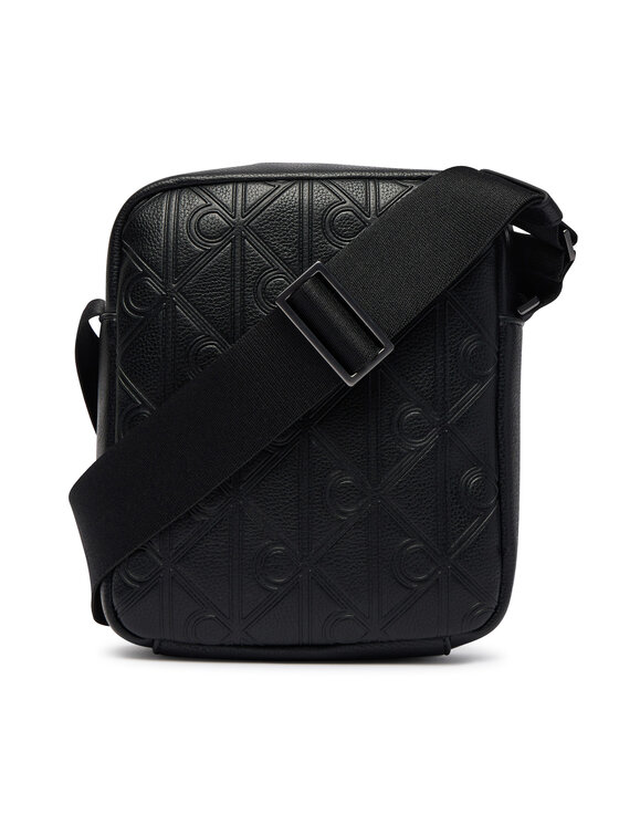 Calvin Klein Calvin Klein Torbica za okrog pasu Emblem Aop Deboss Reporter LV04D3562G Črna