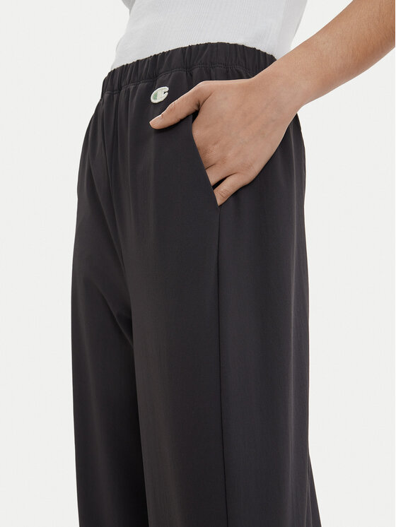 Champion Champion Pantaloni din material 117110 Gri Relaxed Fit