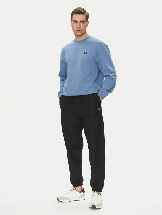 Calvin Klein Jeans Calvin Klein Jeans Teplákové kalhoty Premium LV04RC279G Černá Regular Fit