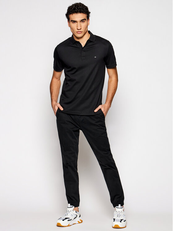 Calvin Klein LIQUID TOUCH SLIM - Polo shirt - black 