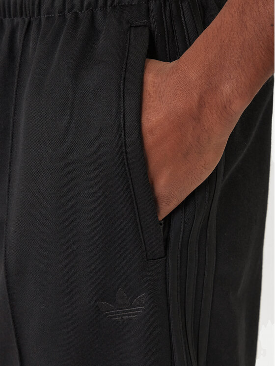adidas adidas Pantaloni trening adicolor KE3500 Negru Loose Fit