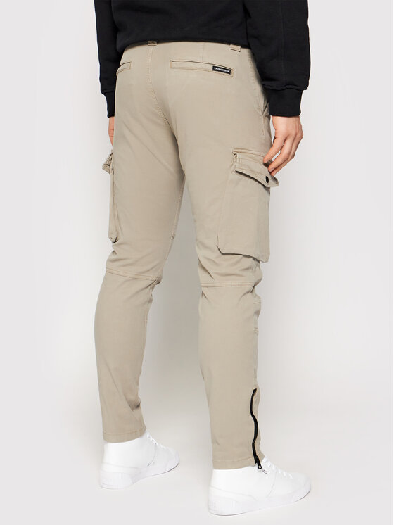Calvin Klein Jeans Pantaloni di tessuto J30J318325 Beige Skinny Fit •  Modivo.it