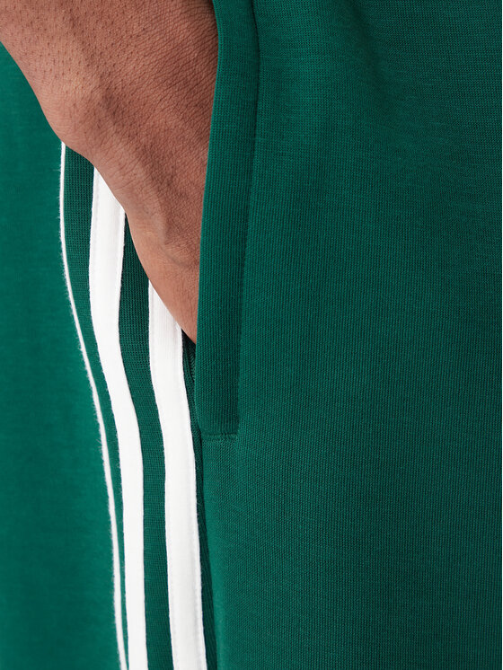 adidas adidas Спортивні штани adicolor Spacer Track KD4088 Зелений Baggy Fit