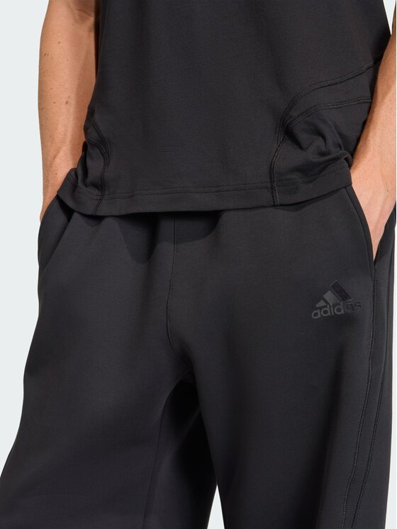 adidas adidas Spodnie materiałowe 159229 Czarny Loose Fit