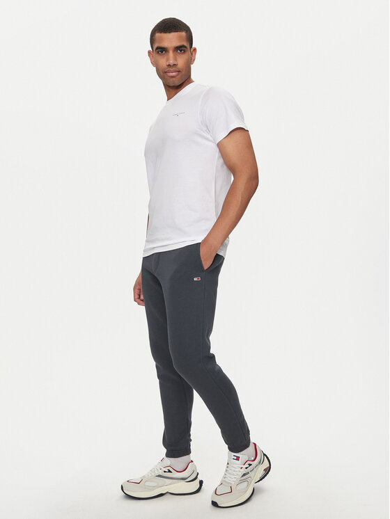 Tommy Jeans Tommy Jeans Spodnji del trenirke Flag DM0DM20473 Siva Slim Fit
