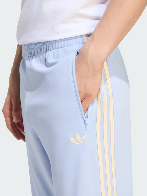 adidas adidas Spodnie materiałowe 159128 Niebieski jasny Regular Fit
