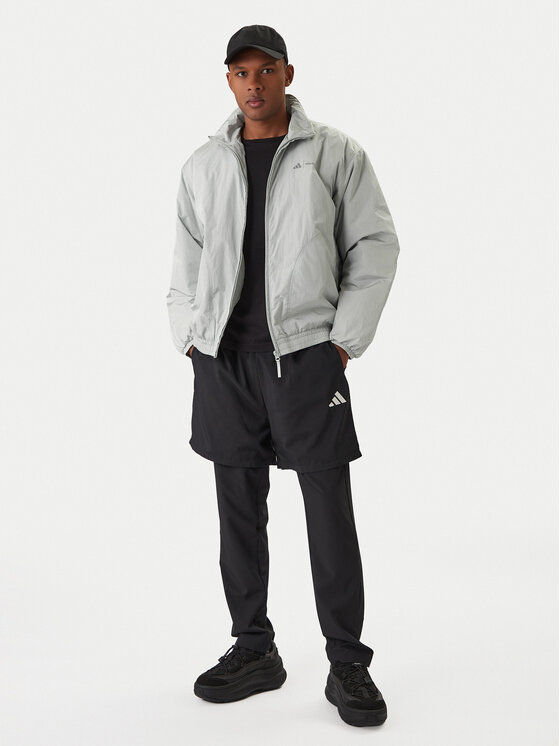 adidas adidas Demisezoninė striukė Moon Boot JM8923 Pilka Loose Fit