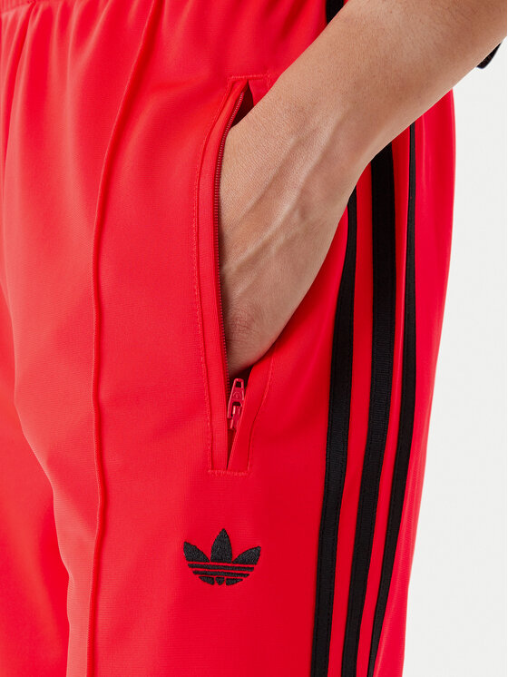 adidas adidas Спортивні штани adicolor Classic Firebird JW1227 Оранжевий Loose Fit