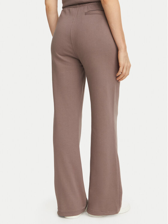 Calvin Klein Jeans Calvin Klein Jeans Spodnie dresowe Monogram LV047H220G Beżowy ciemny Regular Fit