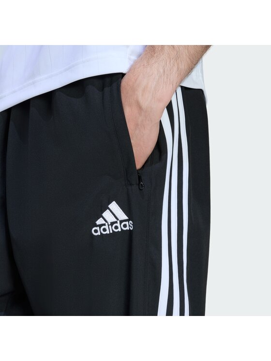 adidas adidas Spodnie materiałowe 152583 Czarny Loose Fit