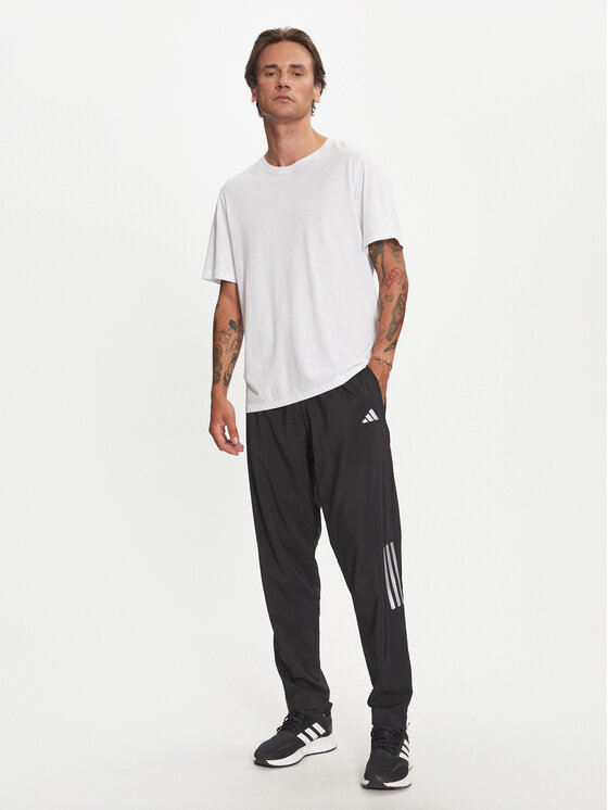 adidas adidas Долнище анцуг Own the Run HR6611 Черен Regular Fit