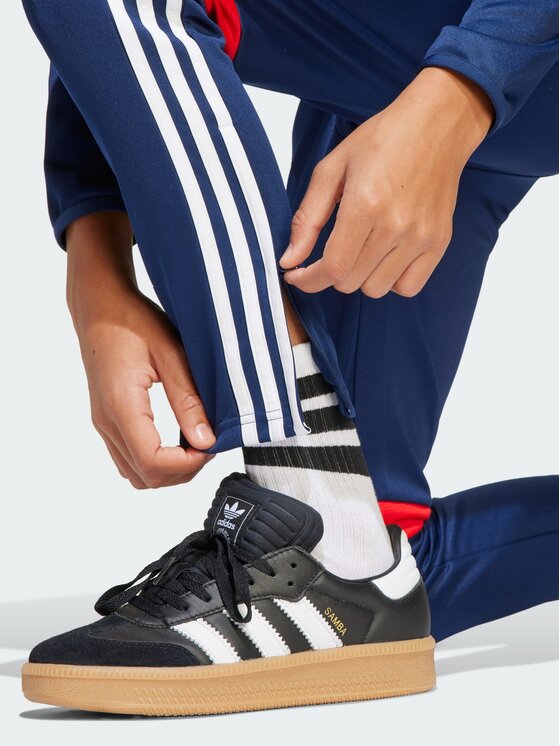 adidas adidas Spodnie materiałowe Tiro Niebieski jasny Slim Fit