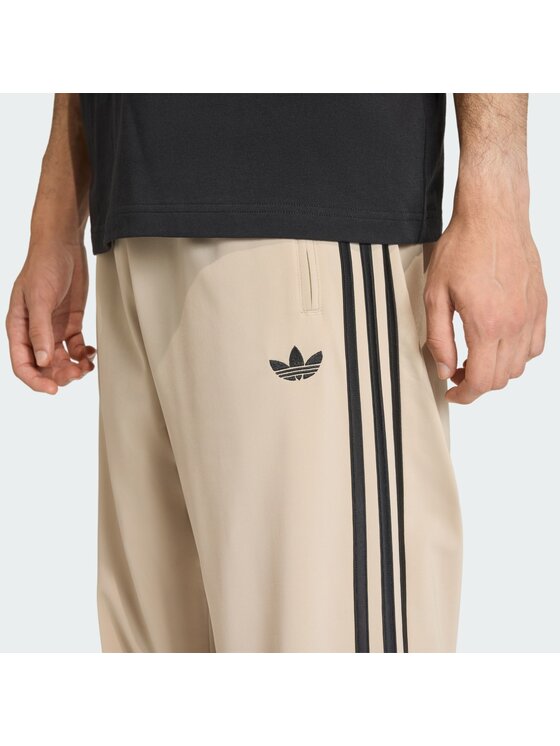 adidas adidas Долнище анцуг Firebird KE6679 Бежов Loose Fit
