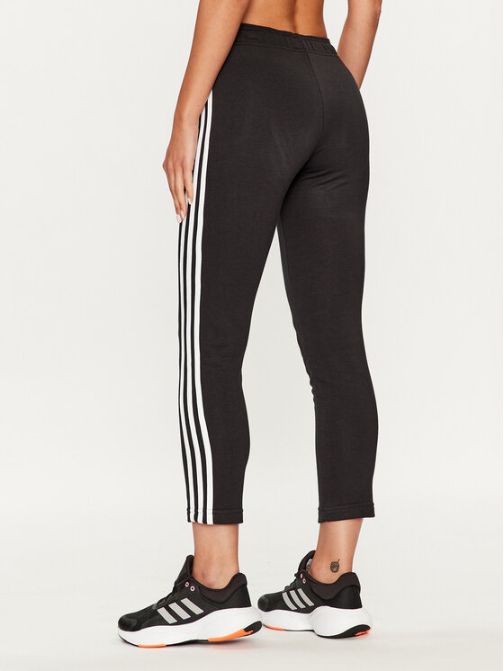adidas adidas Spodnie dresowe Essentials 3-Stripes IC6126 Czarny Slim Fit