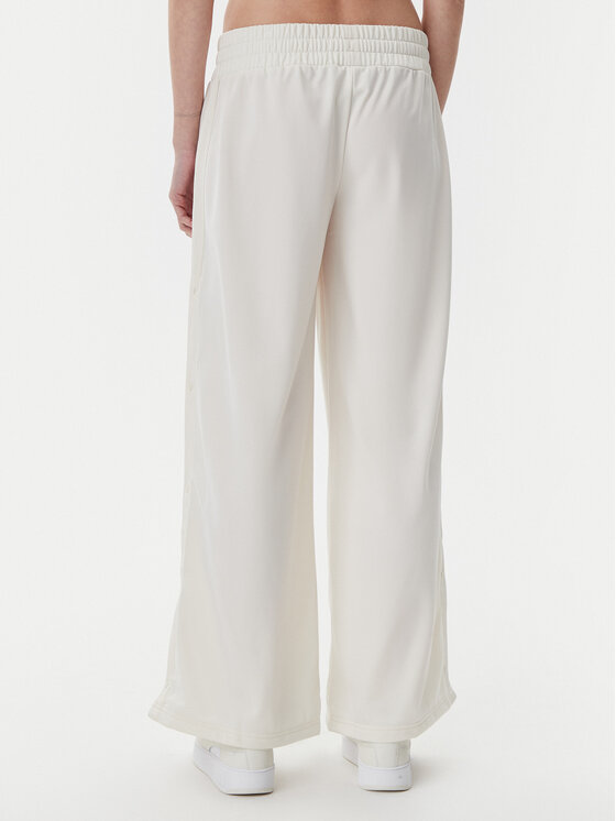 Puma Puma Donji dio trenerke Ess 629804 Bež Wide Leg