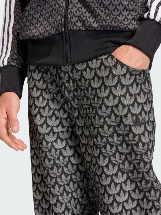 adidas adidas Spodnie dresowe DENIM LOOSE MONOGRAM Czarny Loose Fit