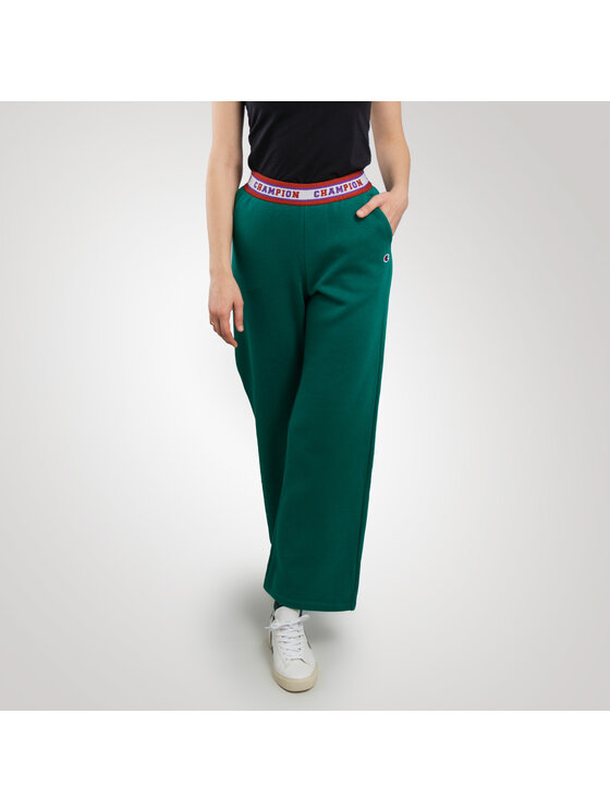 Champion Champion Spodnie dresowe 116634-GS571-AVT_S Zielony Relaxed Fit