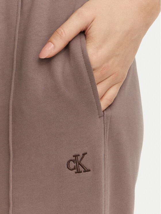 Calvin Klein Jeans Calvin Klein Jeans Долнище анцуг Monogram LV047H220G Тъмнобежов Regular Fit