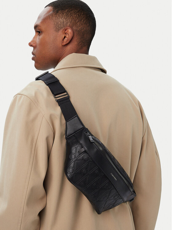 Calvin Klein Чанта за кръст﻿ Emblem Aop Deboss Waistbag LV04D3564G Черен