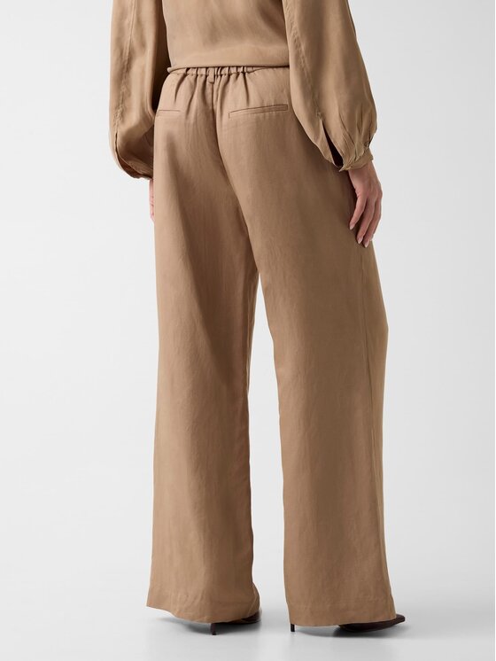Guess Guess Spodnie materiałowe 181488 Beżowy Slim Fit