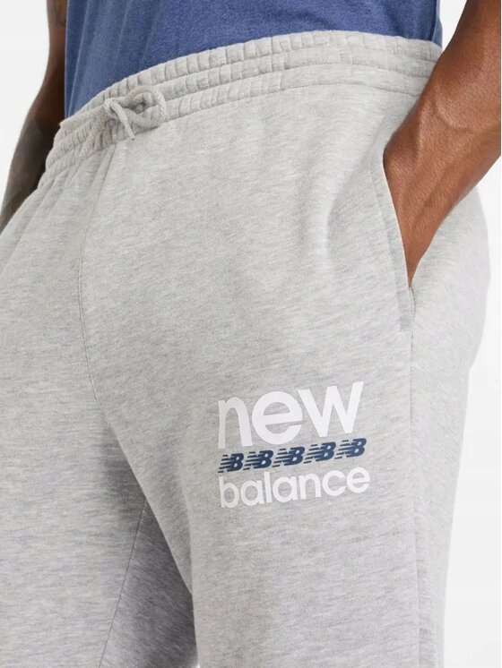 New Balance New Balance Spodnie dresowe MP51940AG Szary Standard Fit