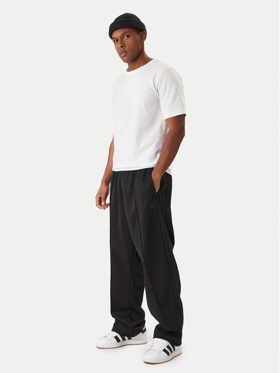 adidas adidas Pantaloni trening adicolor KE3500 Negru Loose Fit