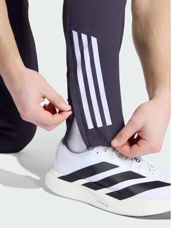 adidas adidas Spodnie materiałowe 161619 Fioletowy Regular Fit