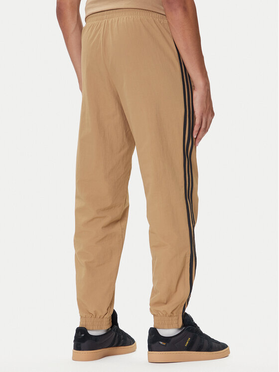 adidas adidas Donji dio trenerke adicolor Woven Firebird JY1339 Bež Regular Fit