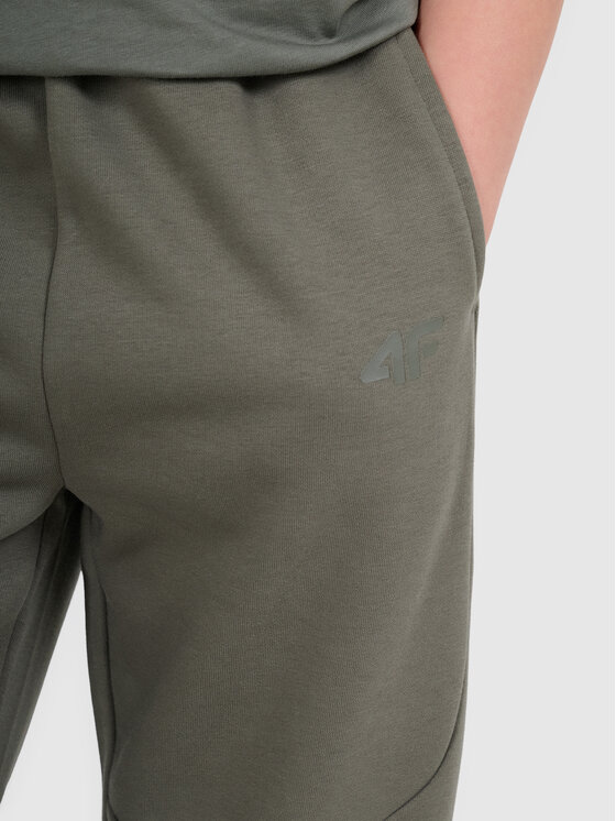 4F 4F Spodnie dresowe URBAN COMMUTER Szary ciemny Loose Fit
