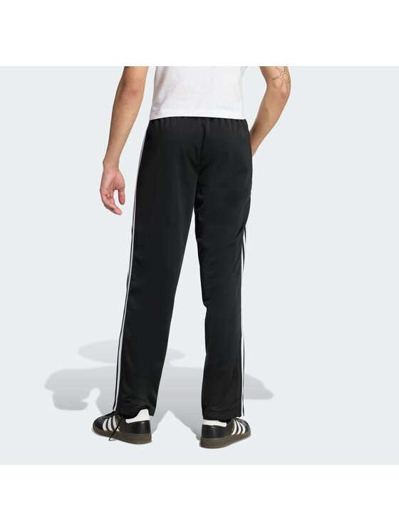 adidas adidas Παντελόνι φόρμας Firebird KD8315 Μαύρο Loose Fit