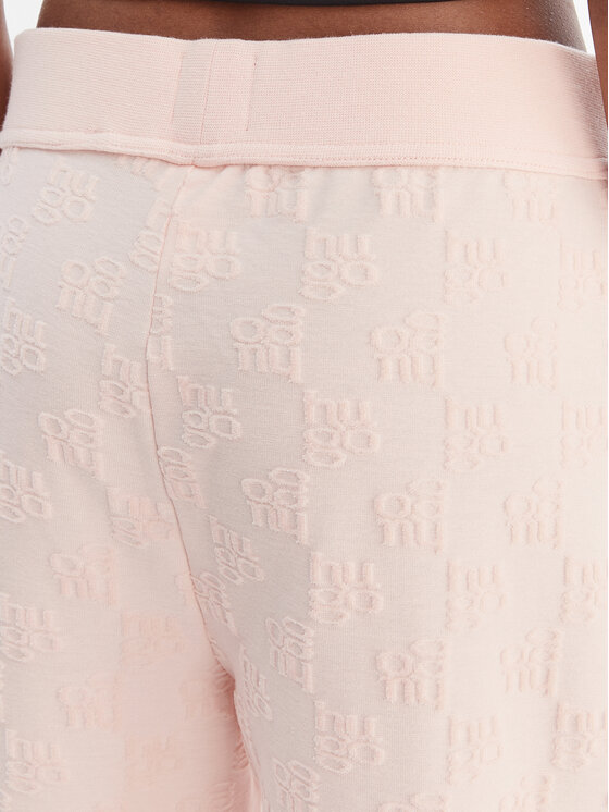 HUGO HUGO Spodnji del trenirke Monogram 50556809 Svetlo rožnata Regular Fit