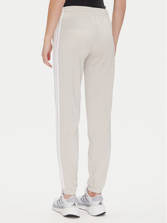 adidas adidas Spodnie dresowe Tricot 3-Stripes JD4536 Beżowy Regular Fit