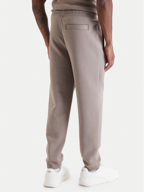 HUGO HUGO Spodnie dresowe Dimacs 50533695 Beżowy Relaxed Fit