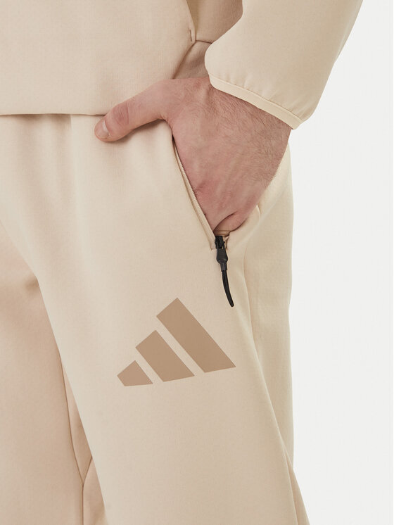 adidas adidas Teplákové kalhoty Z.N.E. KE4684 Béžová Regular Fit