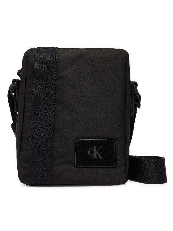 Calvin Klein Calvin Klein Geantă crossover Canvas Mix Reporter LV04D3366G Negru