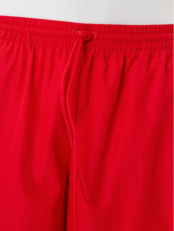 adidas adidas Долнище анцуг adicolor Firebird JD3388 Червен Loose Fit