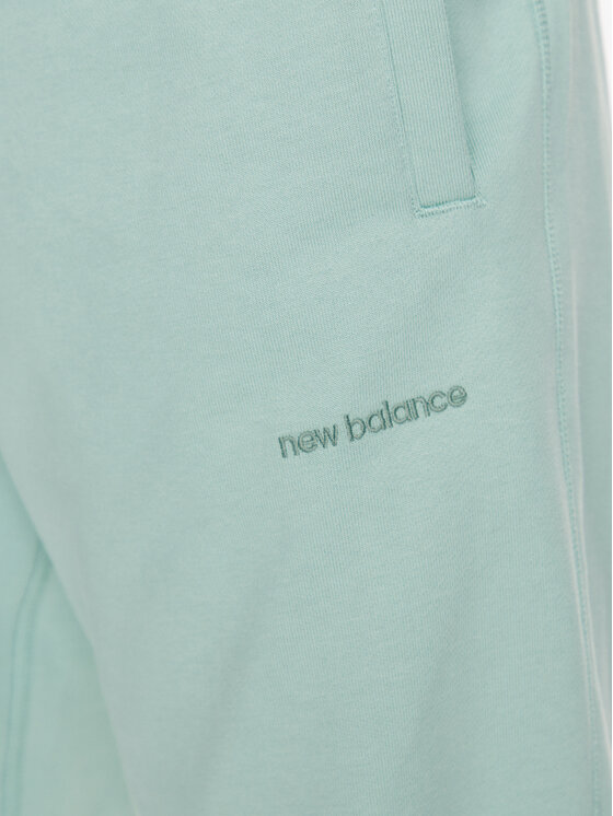 New Balance New Balance Spodnie dresowe MP23551 Zielony Relaxed Fit