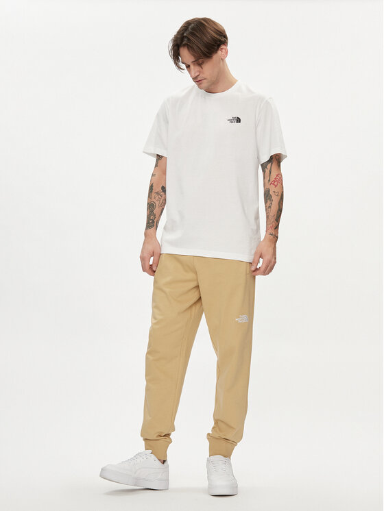 The North Face The North Face Παντελόνι φόρμας Nse Light NF0A4T1F Μπεζ Regular Fit