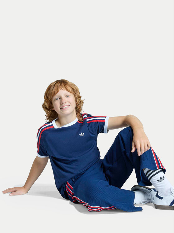 adidas adidas Παντελόνι φόρμας Firebird Double Knit KD7825 Σκούρο μπλε Loose Fit