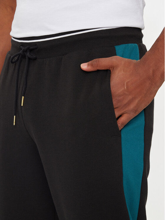 Puma Puma Jogginghose T7 PLAY.PARIS 626768 01 Schwarz Regular Fit