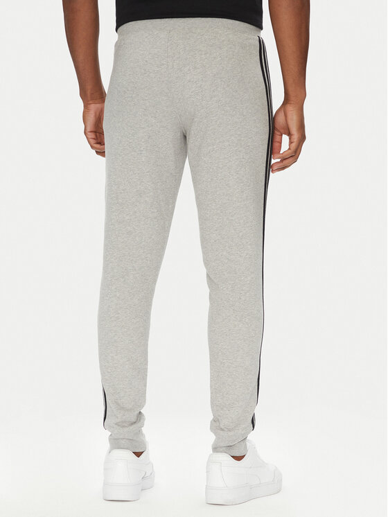 adidas adidas Pantaloni trening adicolor 3-Stripes JY1387 Gri Slim Fit