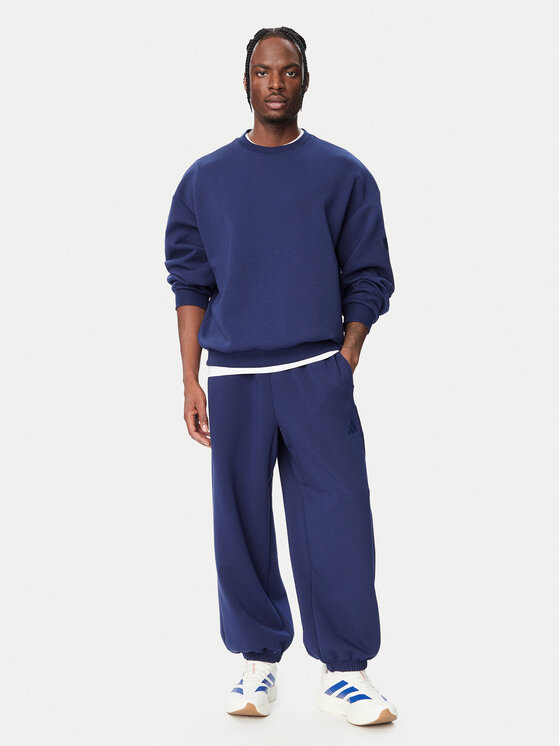 adidas adidas Spodnji del trenirke Soft Lux KS2775 Modra Loose Fit