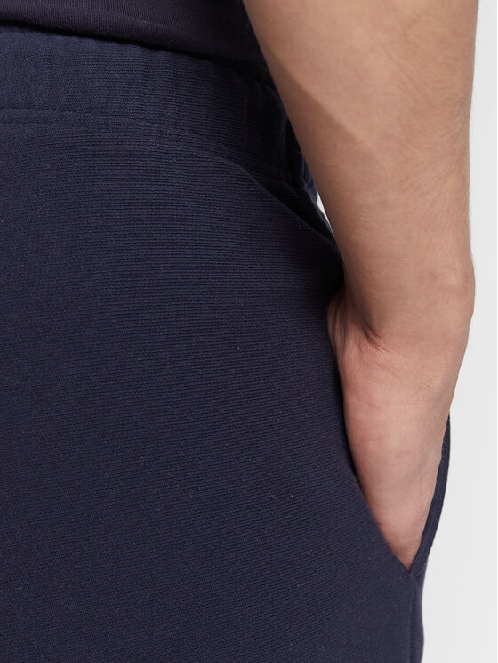 Champion Champion Spodnji del trenirke Acid Wash 217982 Mornarsko modra Custom Fit