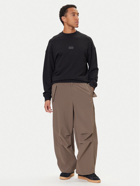 adidas adidas Pantaloni din material Premium Essentials Utility Parachute JW1087 Maro Loose Fit